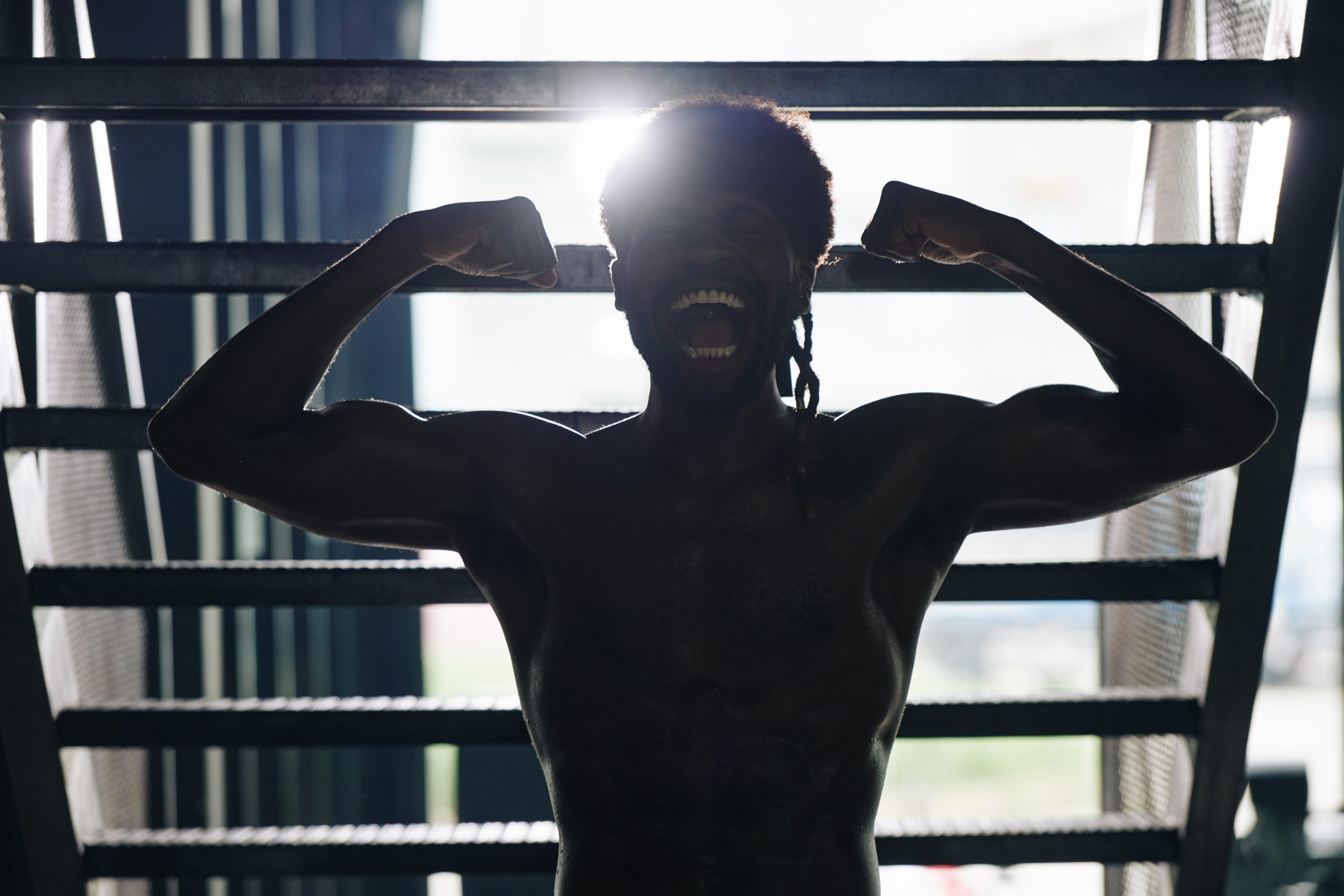 Athlete showing his muscules